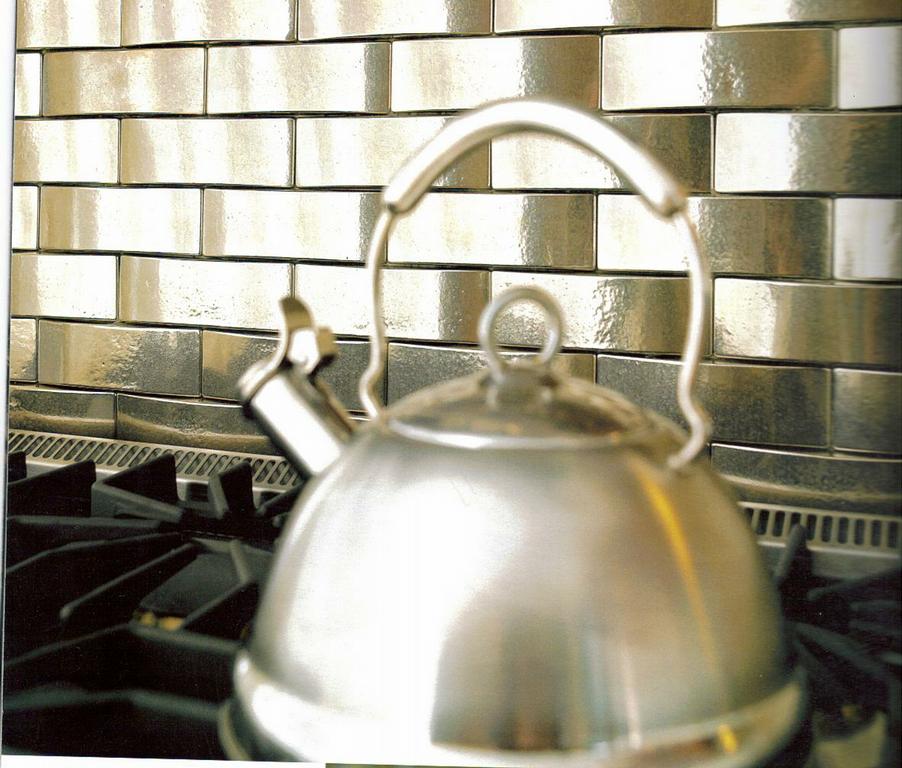 BRONZE ARCH TILE ON A KITCHEN BACKSPLASH from Vitruvian Designs in